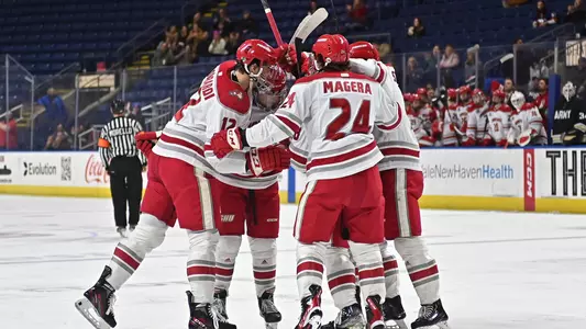 The Pios celebrate a goal against Army on Jan. 5, 2023.