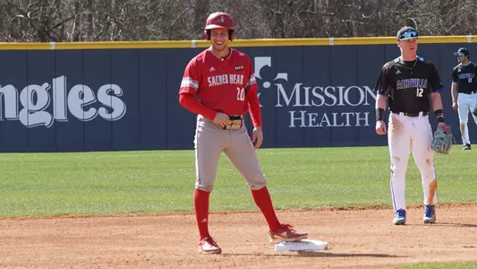 Tim McGuire stands on second base