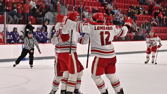 The Pios celebrate a goal