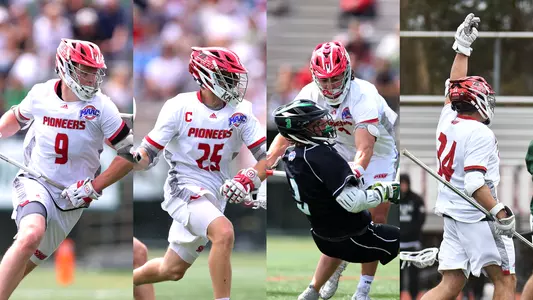Four men's lacrosse players