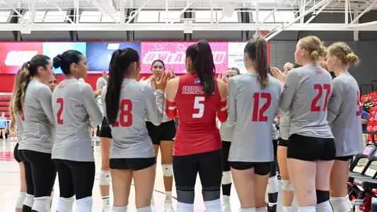 Women's Volleyball Team Huddle
