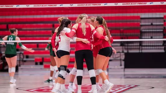 Women's Volleyball Team Huddle