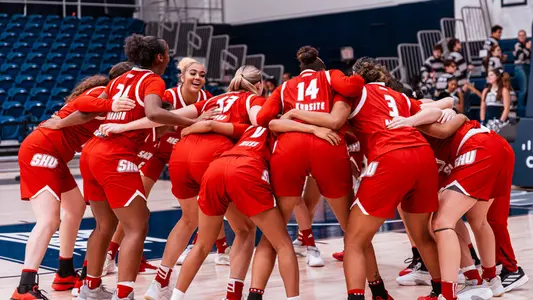 Women's Basketball Team Huddle