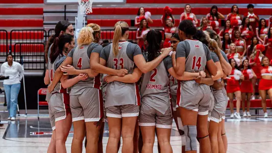 Women's Basketball Team Huddle