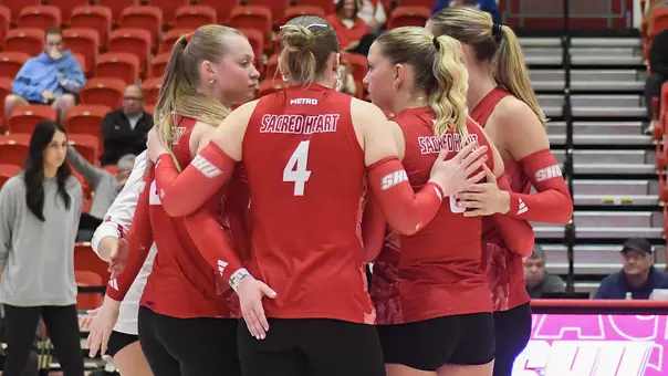 Women's Volleyball Team Huddle
