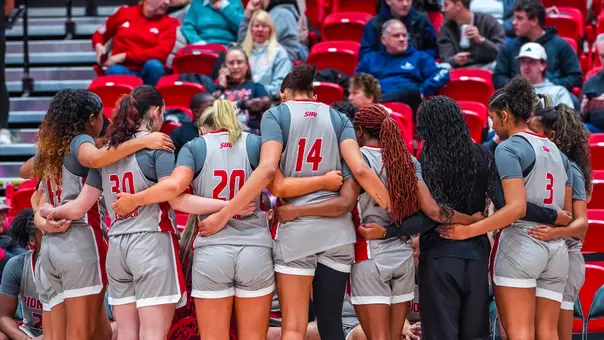 Women's Basketball Team Huddle