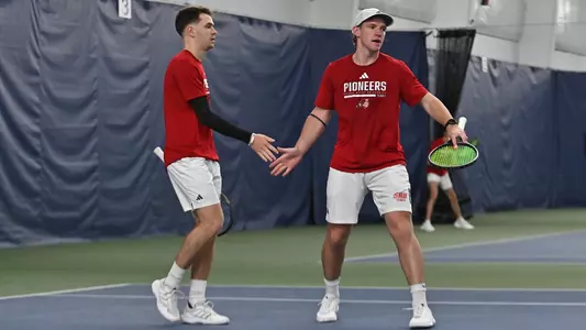 Men's Tennis Doubles Team High Five