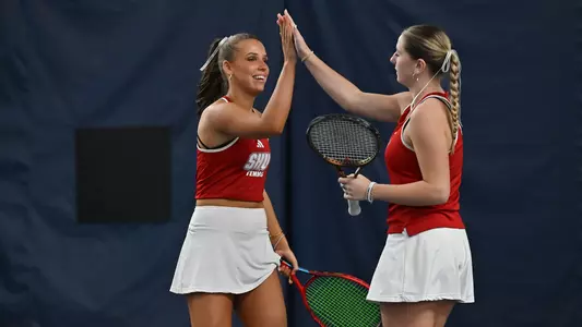 Women's Tennis Doubles Team High Five