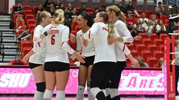 Women's Volleyball Team Huddle Celebration