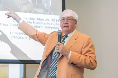 Dr. James Andrews speaking at Bulldog Club Luncheon