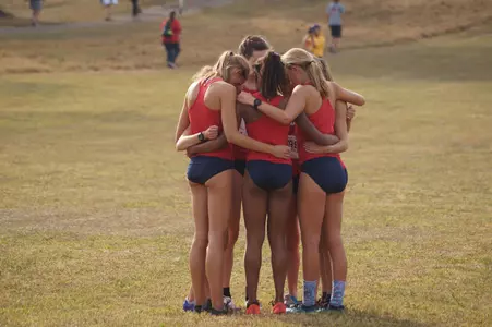 Cross Country team praying, 2016
