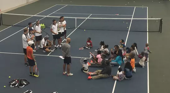 Men's Tennis at outreach program