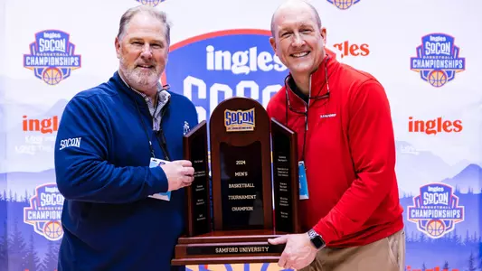 Martin Newton and Beck Taylor with 2024 SoCon MBB Trophy
