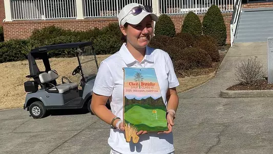 Gabi Nicastro with trophy from Chris Banister Golf Classic 2025