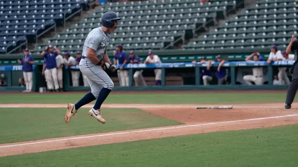 Jackson Harris celebrates a HR vs Western Carolina in 2026 SoCon Tournament