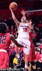 Cynthia Hernandez completed a four-point play to give RU its first 100-point game since 1995
