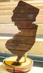 The origins of the newly-named Garden State Hardwood Classic between Rutgers and Seton Hall, which now awards this trophy to the winner each year, can be traced to the days of Frank J. Hill, the only person to coach both schools.