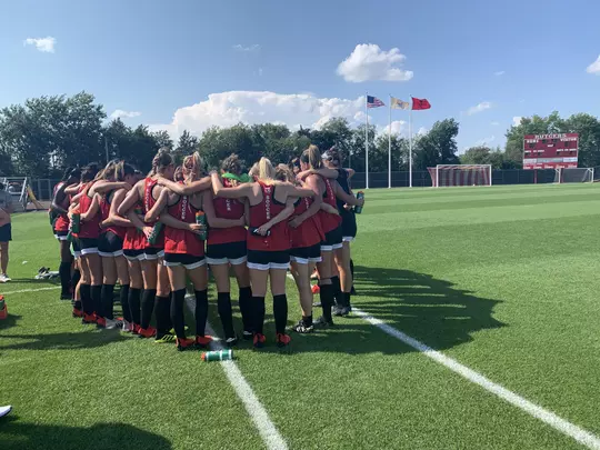 Scrimmage vs. Navy - huddle