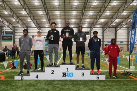 Anan Bridgett receives the gold medal in the long jump at 2022 Big Ten Indoor Championships