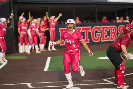 Kobie Hura scores a run against Fairfield during the Rutgers Softball Tournament