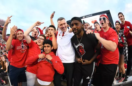 AD Pat Hobbs celebrates with students at SHI Stadium