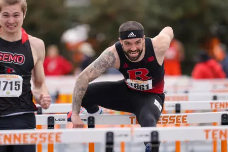 Andrew Daniluk hurdling