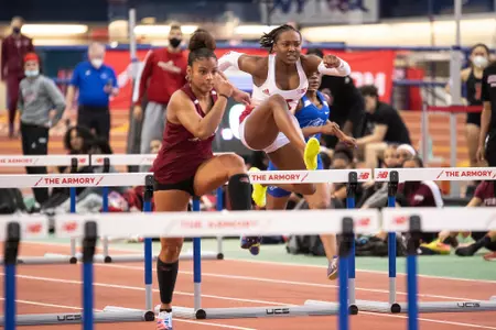 Claudine Smith hurdling