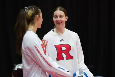 Alissa Kinkella & Kristina Grkovic on the sidelines against Iowa