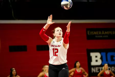 Taylor Humphrey serving during the Rutgers volleyball match with Michigan