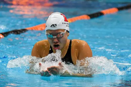 Elysha Pribadi competes in the breast stroke at Princeton in the annual Battle For The Cannon Trophy