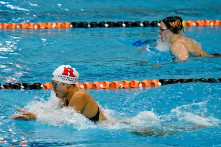 Elysha Pribadi competing in the breast stroke against Princeton at DeNuzio Pool in the annual Battle for the Cannon Trophy