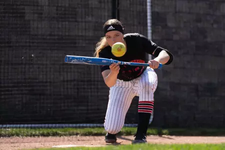 Softball's Katie Wingert bunting during practice at Beard Field during the Penn State series