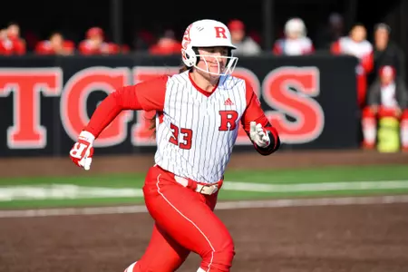 Kiersten Withstandley running to first during the weekend series with Purdue