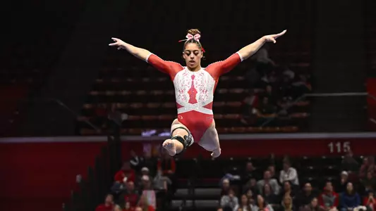 Gianna Ortiz on the balance beam