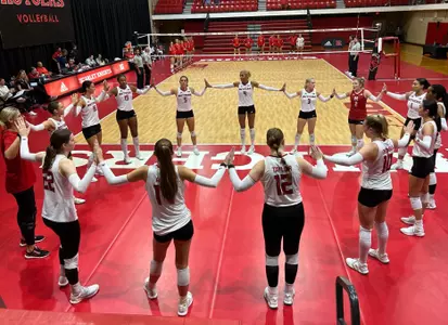Rutgers circles up prior to introductions against Marist in its 2023 home opener