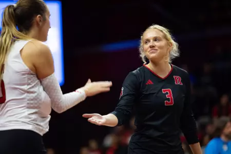 Rutgers volleyball's Aly Borellis and Kenzie Dyrstad during the match with No. 11 Purdue at Jersey Mike's Arena