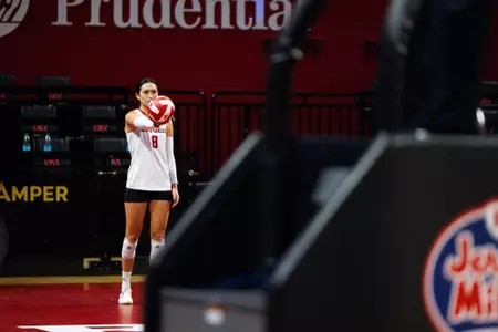 Lexi Visintine about to serve against then-No. 11 Purdue at Jersey Mike's Arena in the first meeting with the Boilermakers