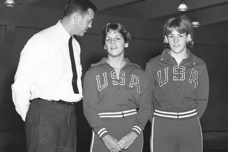 Frank Elm was a coach of the 1964 U.S. Olympic Team, of which Sue Pitt-Anderson and Ginnie Duenkel were members.