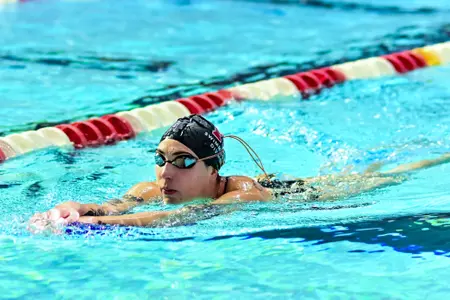 Molly Urkiel warming up against Purdue at the Rutgers Aquatics Center
