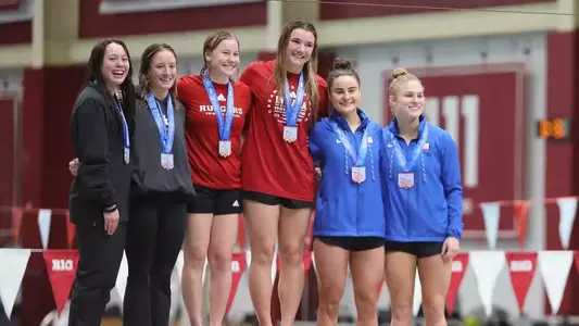 Bailee Sturgill on the podium after winning the synchronized 3M title at 2024 USA Diving Winter Diving National