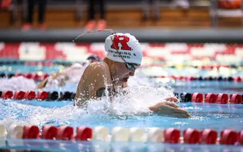 Molly Urkiel competes in the breaststroke against Princeton in the annual Battle For The Cannon Trophy vs.