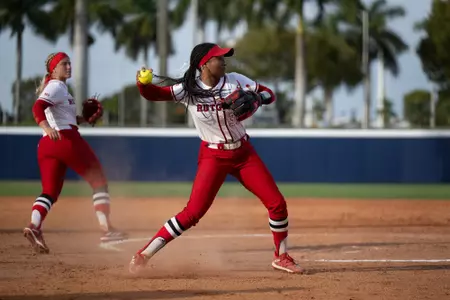 Morgan Smith throws to first during Rutgers softball's contest versus No. 10 Duke at the Panther Invitational