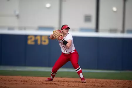 Second baseman Maddie Lawson on the throw to first during Rutgers softball's game with No. 10 Duke at the Panther Invitational