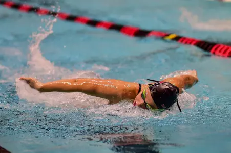 Viktoriia Kostromina swimming the butterfly against LIU in November at the Rutgers Aquatics Center