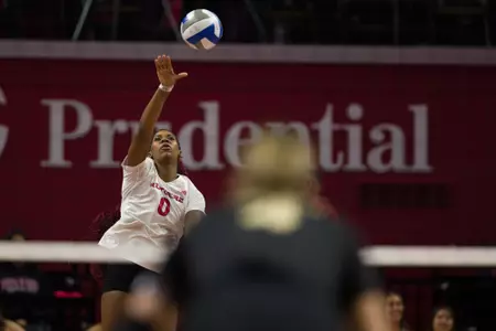 Aspen Maxwell serving against No. 12 Purdue
