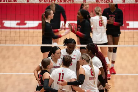 Rutgers huddles at the College Ave Gym against Ohio State