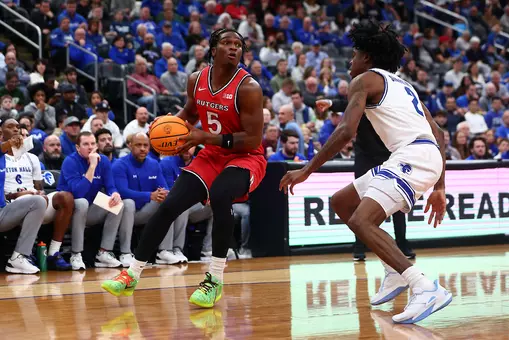 View game action images as Rutgers men's basketball takes on Seton Hall in the Garden State Hardwood Classic.