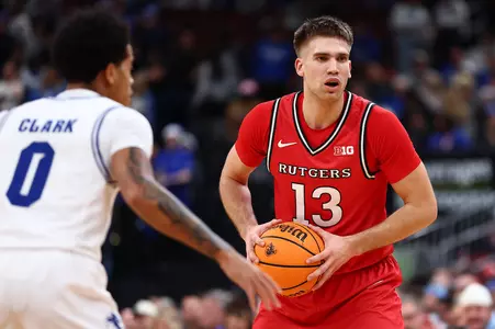 View game action images as Rutgers men's basketball takes on Seton Hall in the Garden State Hardwood Classic.