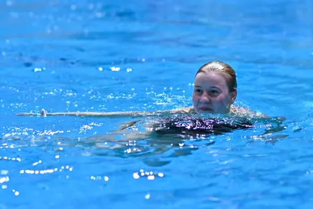 Bailee Sturgil in the diving well at the Rutgers Aquatics Center