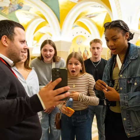 Alleigh Dutton surprised during the tour of the Church of Saint Slava in Belgrade, Serbia